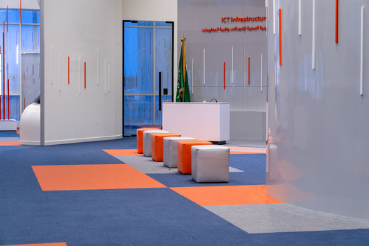 ICT Infrastructure Zone – bold colors, modern wall design, and custom seating cubes create an immersive, tech-driven interior—implemented by Atelier 21, Top Interior Fit-out Company in Saudi Arabia and Riyadh.
منطقة البنية التحتية للاتصالات وتقنية المعلومات – تصميم عصري بألوان جريئة ومقاعد مكعبة مخصصة تعكس بيئة تقنية مبتكرة – من تنفيذ أتيليه 21، أفضل شركة تنفيذ تشطيبات داخلية في السعودية والرياض. 3