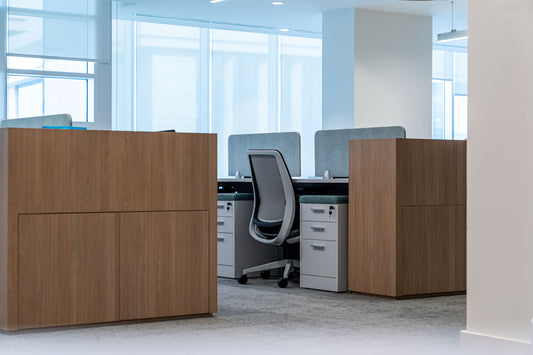 Compact workstation cluster at Azm Saudi Project, featuring ergonomic office chairs, desks with partitions, and integrated storage for efficiency. Designed by a Top Office Designer in Riyadh and furnished by a Top Office Furniture Supplier in Saudi Arabia, the layout enhances functionality and productivity. محطة عمل مكتبية حديثة في مشروع عزم السعودية من تصميم أفضل مصمم مكاتب في السعودية وتشطيب من أفضل شركة تنفيذ تشطيبات داخلية في الرياض. 8
