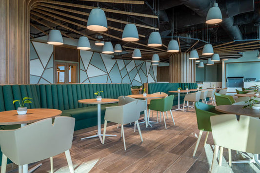 Modern cafeteria design at AlMoosa Tower by Atelier 21 KSA | مفن الرسام, أفضل مصمم داخلي في الرياض. Featuring elegant seating, custom tables, and warm finishes, this space reflects the work of the Top Interior Fit-out Company in Saudi Arabia. As أفضل مورد أثاث مكتبي في السعودية, we delivered fitted furniture and turnkey interiors, proving why we're the Top Furniture Supplier in Riyadh and أفضل مصمم مكاتب في السعودية. 4