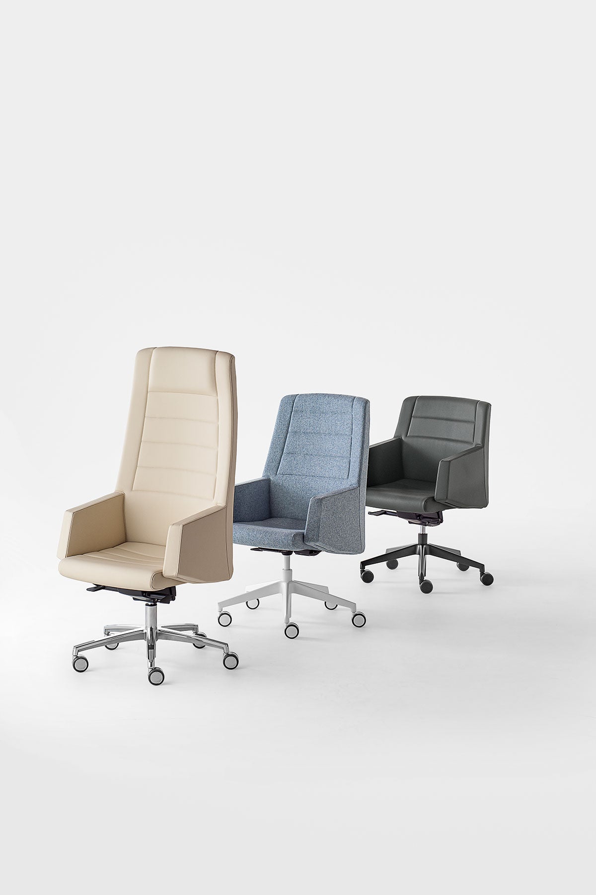 Kamelia chair by Kastel Italy – premium executive office chair available in beige leather, blue fabric, and dark grey leather, with high backrest and aluminum base with wheels – imported and supplied by Atelier 21 KSA, Top Interior Designer, Office Designer, Furniture Supplier, and Interior Fit-out Company in Saudi Arabia and Riyadh. كرسي كامليا من كاستل إيطاليا – كرسي مكتبي فاخر عالي الجودة من تنفيذ مفن الرسام، أفضل شركة ديكور وتشطيب داخلي في السعودية والرياض.