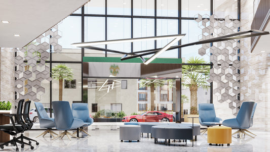 Lobby space at Welaya in Riyadh featuring modern blue lounge chairs, ottomans, and yellow stools on glossy marble floors. Large windows bring in natural light and city views. A bold chandelier and geometric wall dividers complete the contemporary look. تصميم داخلي حديث في مشروع ولاية بالرياض، يشمل كراسي استرخاء، مقاعد انتظار، طاولات متعددة الاستخدام، ديكور عصري، إضاءة معلقة، وفواصل زخرفية تضيف لمسة فنية لمقر حكومي مميز في مدينة الرياض. 17